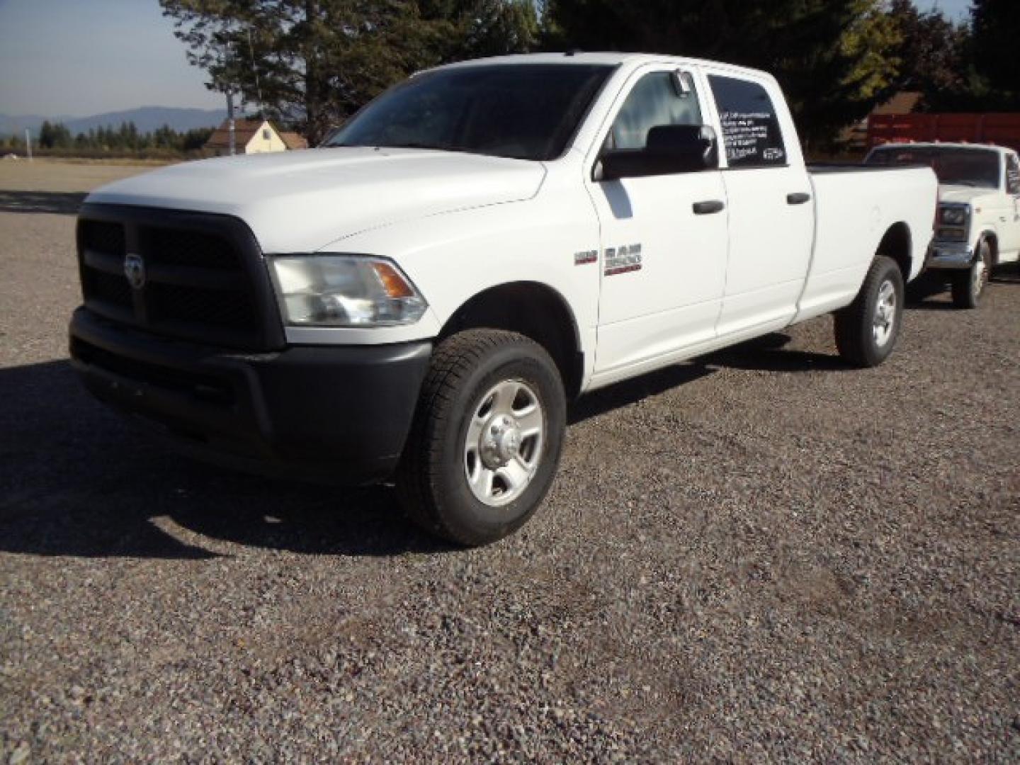 2014 White /Grey RAM 3500 Tradesman (3C63R3GT8EG) with an 5.7L V8 OHV 16V engine, 6-Speed Automatic transmission, located at 5465 Highway 2 W., Columbia Falls, MT, 59912, (406) 892-4407, 48.352188, -114.240929 - Photo#2