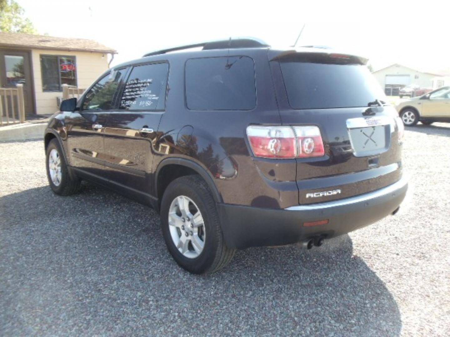 2009 Purple /Silver GMC Acadia SLE-1 AWD (1GKEV13D29J) with an 3.6L V6 DOHC 24V engine, 6-Speed Automatic transmission, located at 5465 Highway 2 W., Columbia Falls, MT, 59912, (406) 892-4407, 48.352188, -114.240929 - Photo#4