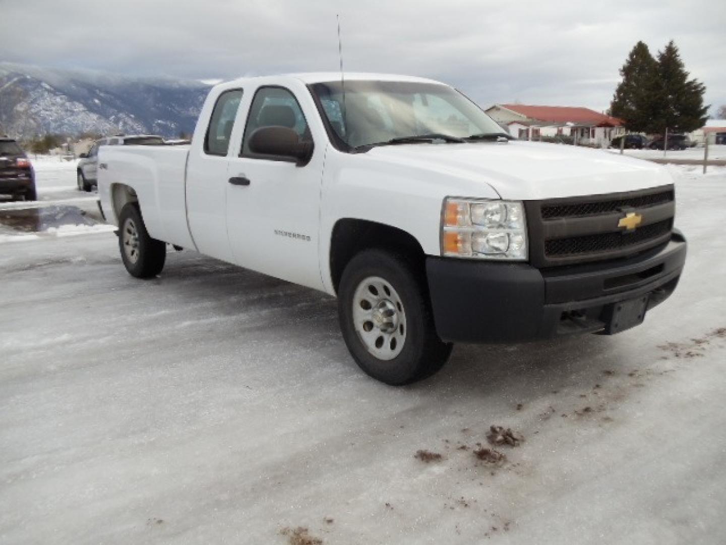 2012 White /Gray Chevrolet Silverado 1500 Work Truck Ext. Cab 4WD (1GCRKPE06CZ) with an 5.3L V8 OHV 16V FFV engine, 4-Speed Automatic transmission, located at 5465 Highway 2 W., Columbia Falls, MT, 59912, (406) 892-4407, 48.352188, -114.240929 - This truck was previously owned by the federal government so it has been well maintained and taken care of. The truck is clean inside and out with good tires and low actual miles. This is the Quad Door Long Box. - Photo#0