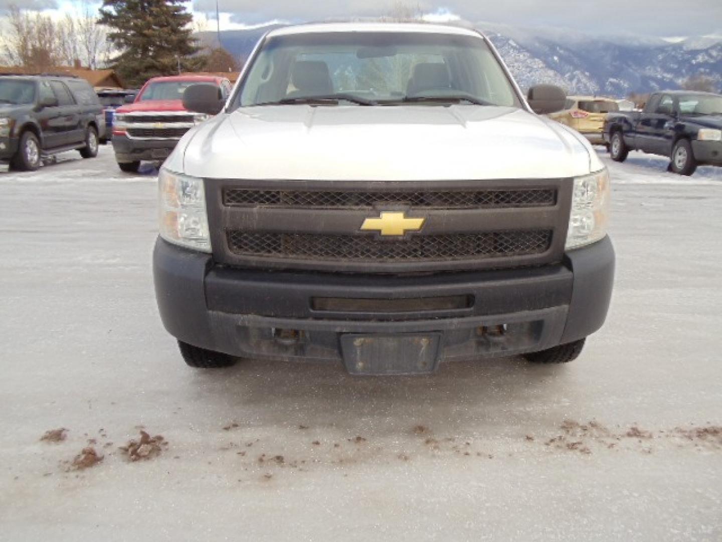 2012 White /Gray Chevrolet Silverado 1500 Work Truck Ext. Cab 4WD (1GCRKPE06CZ) with an 5.3L V8 OHV 16V FFV engine, 4-Speed Automatic transmission, located at 5465 Highway 2 W., Columbia Falls, MT, 59912, (406) 892-4407, 48.352188, -114.240929 - This truck was previously owned by the federal government so it has been well maintained and taken care of. The truck is clean inside and out with good tires and low actual miles. This is the Quad Door Long Box. - Photo#1