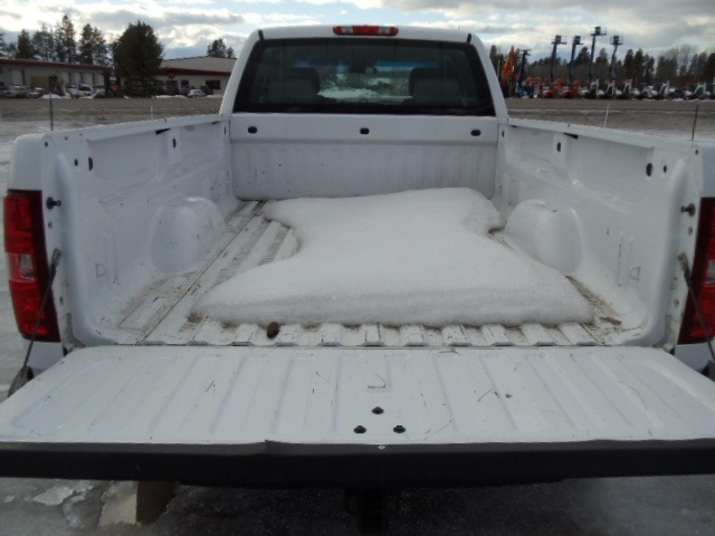 2012 White /Gray Chevrolet Silverado 1500 Work Truck Ext. Cab 4WD (1GCRKPE06CZ) with an 5.3L V8 OHV 16V FFV engine, 4-Speed Automatic transmission, located at 5465 Highway 2 W., Columbia Falls, MT, 59912, (406) 892-4407, 48.352188, -114.240929 - This truck was previously owned by the federal government so it has been well maintained and taken care of. The truck is clean inside and out with good tires and low actual miles. This is the Quad Door Long Box. - Photo#7