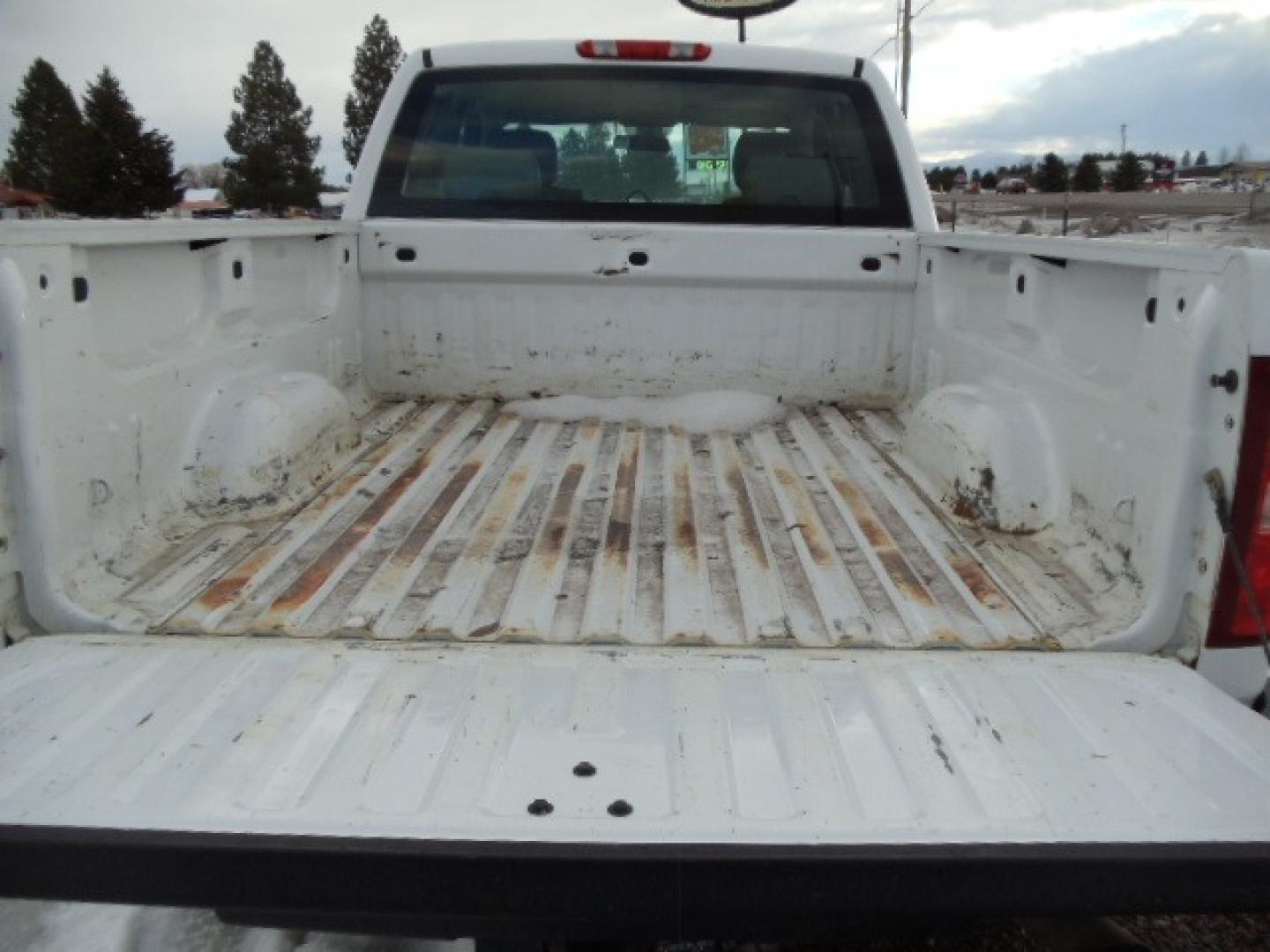 2012 White /Gray Chevrolet Silverado 2500HD Work Truck Ext. Cab 4WD (1GC2KVCG0CZ) with an 6.0L V8 OHV 16V FFV engine, 6-Speed Automatic transmission, located at 5465 Highway 2 W., Columbia Falls, MT, 59912, (406) 892-4407, 48.352188, -114.240929 - This truck was previously owned by the federal government so it has been well maintained and taken care of. This truck is very clean inside and out with good tires and low miles. This is the quad door short box with the 6.0L V8 gas motor. - Photo#7