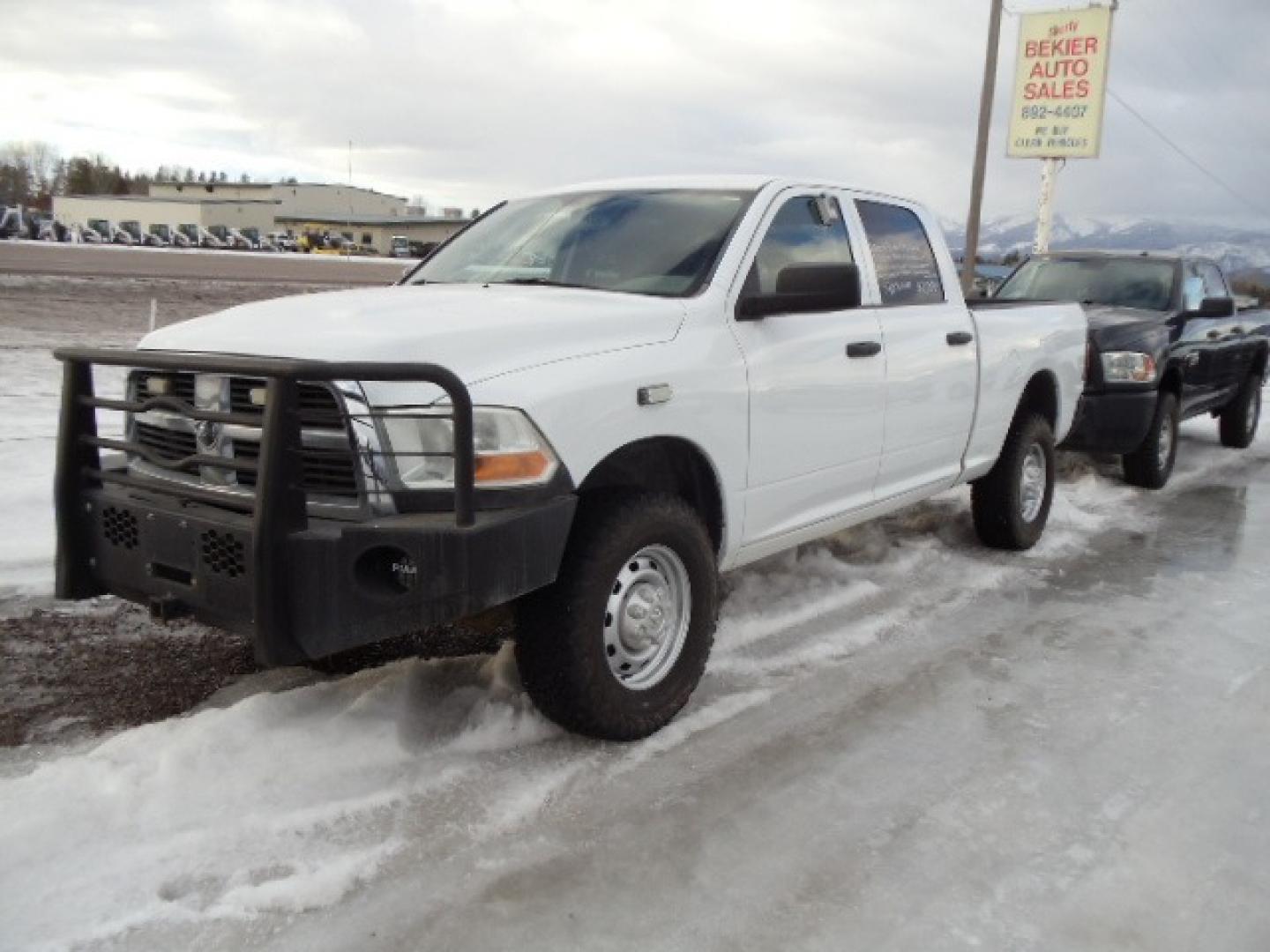 2010 White /Gray Dodge Ram 2500 ST (3D7TT2CT9AG) with an 5.7L V8 OHV 16V engine, Automatic transmission, located at 5465 Highway 2 W., Columbia Falls, MT, 59912, (406) 892-4407, 48.352188, -114.240929 - This truck was previously owned by the federal government so it has been well maintained and taken care of. The truck is very clean inside and out with great tires and low actual miles. This is the crew cab short box with the 5.7L HEMI gas motor. This vehicle has been mechanically inspected. The - Photo#2