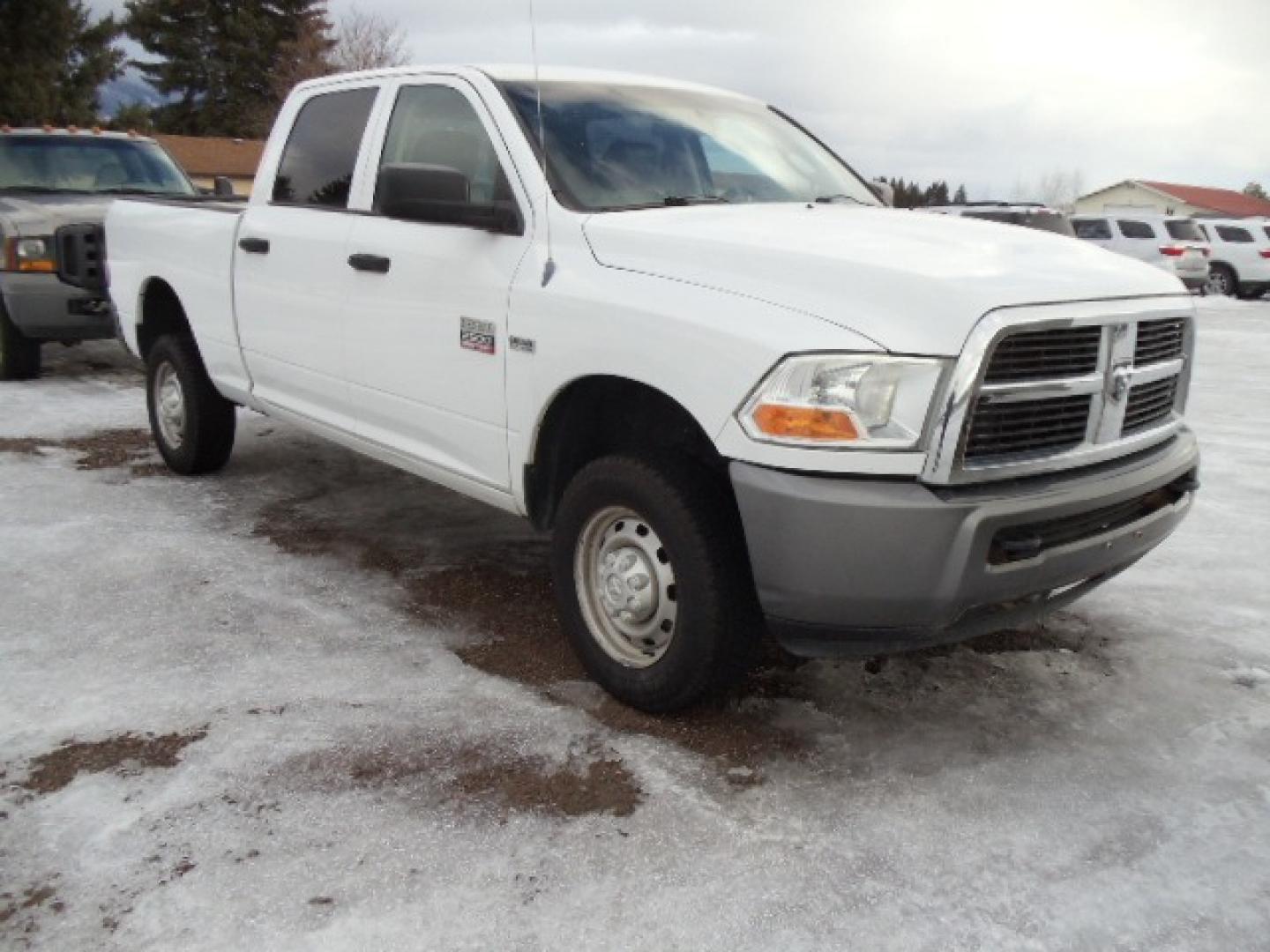 2011 Gray /Gray Dodge Ram 2500 ST Crew Cab 4WD (3D7TT2CT2BG) with an 5.7L V8 OHV 16V engine, Automatic transmission, located at 5465 Highway 2 W., Columbia Falls, MT, 59912, (406) 892-4407, 48.352188, -114.240929 - This truck was previously owned by the federal government so it has been well maintained and taken care of. This truck is very clean inside and out with good tires and low actual miles. This is the crew cab short box with the 5.7L HEMI V8 gas motor. - Photo#0