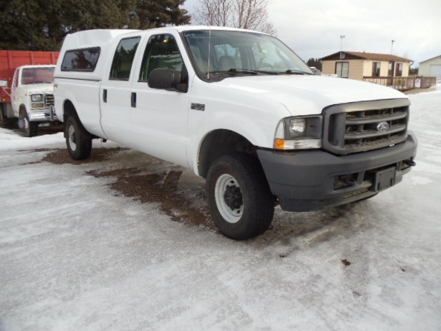 2004 Gray /Gray Ford F-350 SD XL Crew Cab 4WD (1FTSW31L04E) with an 5.4L V8 SOHC 16V engine, 6 Speed Manual transmission, located at 5465 Highway 2 W., Columbia Falls, MT, 59912, (406) 892-4407, 48.352188, -114.240929 - This truck was previously owned by the federal government so it has been well maintained and taken care of. The truck is clean inside and out with good tires and low actual miles. This is the crew cab long box with the 5.4L V8 gas motor. This vehicle is rare with the 6 speed manual transmission. - Photo#0