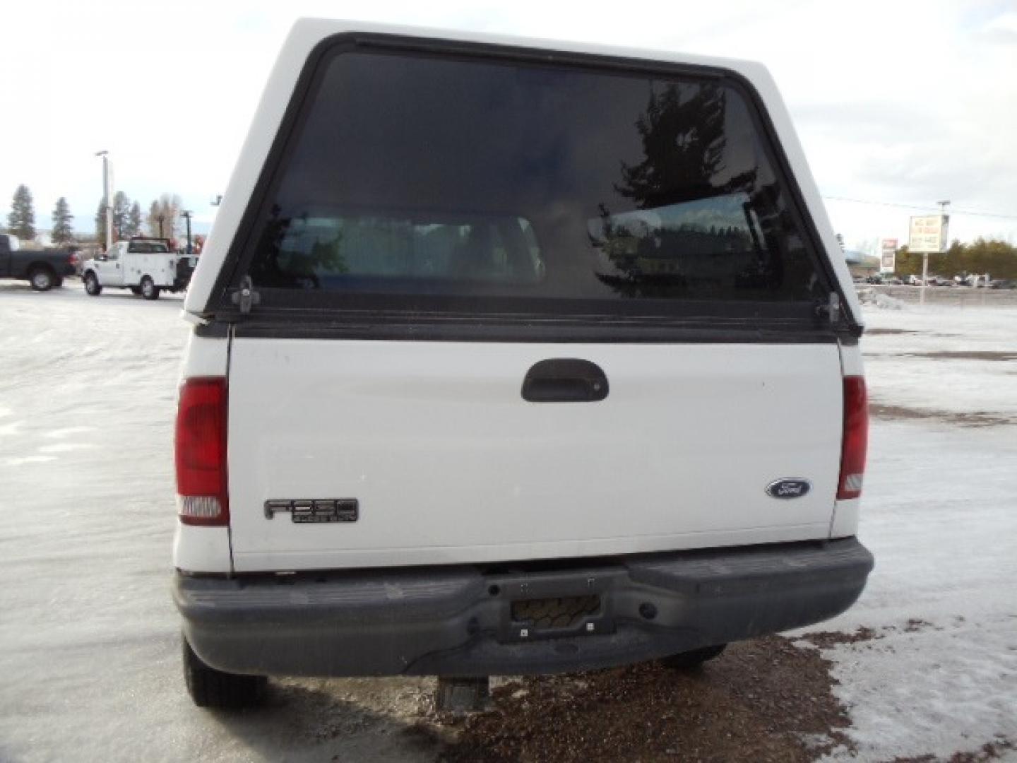 2004 Gray /Gray Ford F-350 SD XL Crew Cab 4WD (1FTSW31L04E) with an 5.4L V8 SOHC 16V engine, 6 Speed Manual transmission, located at 5465 Highway 2 W., Columbia Falls, MT, 59912, (406) 892-4407, 48.352188, -114.240929 - This truck was previously owned by the federal government so it has been well maintained and taken care of. The truck is clean inside and out with good tires and low actual miles. This is the crew cab long box with the 5.4L V8 gas motor. This vehicle is rare with the 6 speed manual transmission. - Photo#5