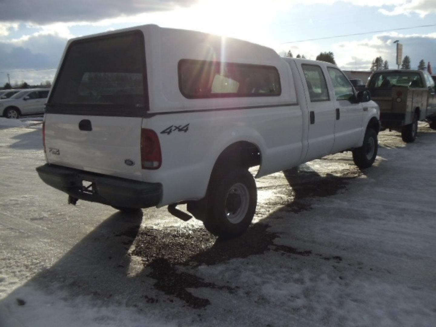 2004 Gray /Gray Ford F-350 SD XL Crew Cab 4WD (1FTSW31L04E) with an 5.4L V8 SOHC 16V engine, 6 Speed Manual transmission, located at 5465 Highway 2 W., Columbia Falls, MT, 59912, (406) 892-4407, 48.352188, -114.240929 - This truck was previously owned by the federal government so it has been well maintained and taken care of. The truck is clean inside and out with good tires and low actual miles. This is the crew cab long box with the 5.4L V8 gas motor. This vehicle is rare with the 6 speed manual transmission. - Photo#8