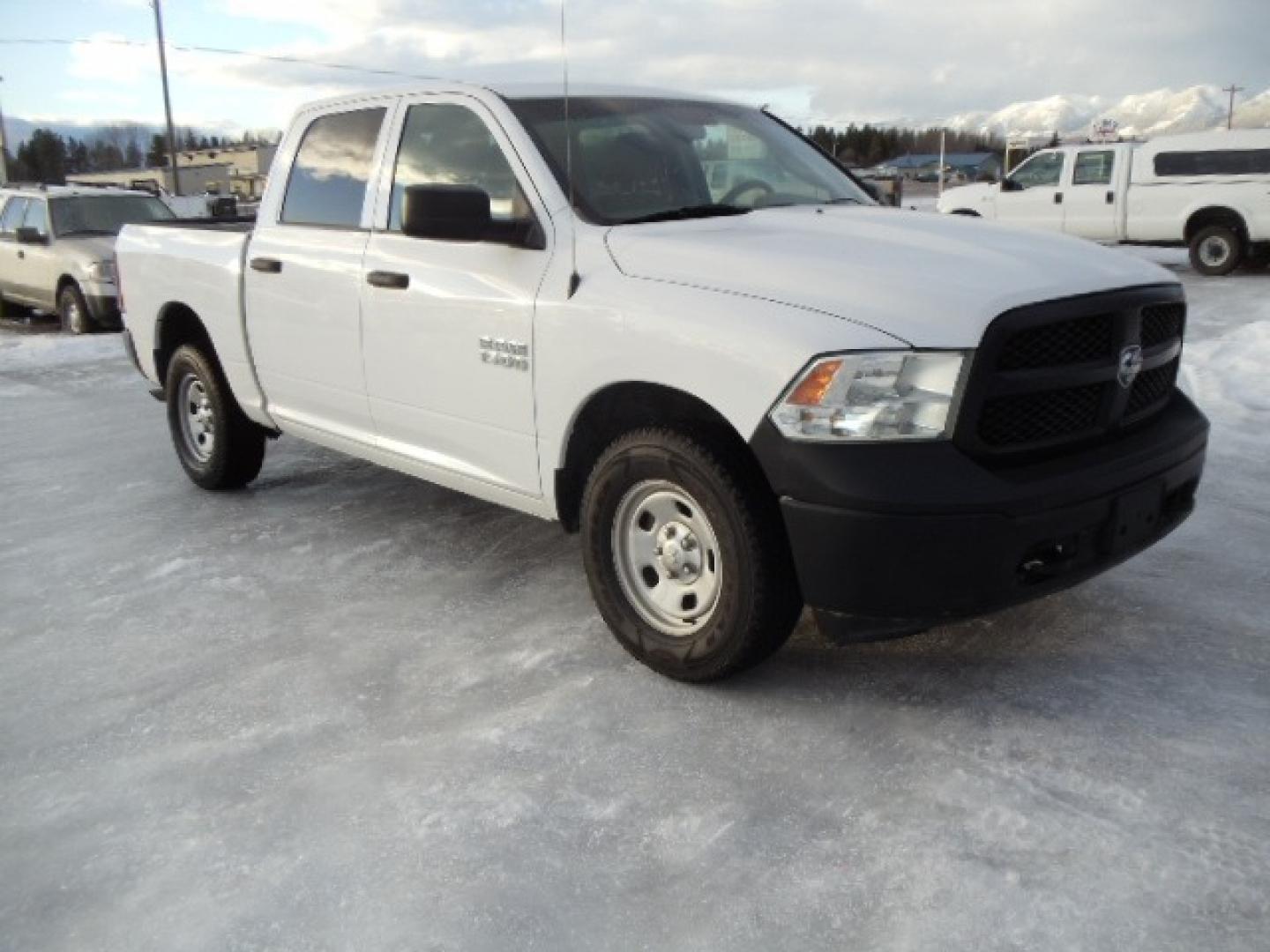 2014 Gray /Gray RAM 1500 Tradesman Crew Cab SWB 4WD (1C6RR7KG3ES) with an 3.6L V6 DOHC 24V FFV engine, 6-Speed Automatic transmission, located at 5465 Highway 2 W., Columbia Falls, MT, 59912, (406) 892-4407, 48.352188, -114.240929 - This truck was previously owned by the federal government so it has been well maintained and taken care of. The vehicle is very clean inside and out with great tires and low miles. This is the crew cab short box. - Photo#0