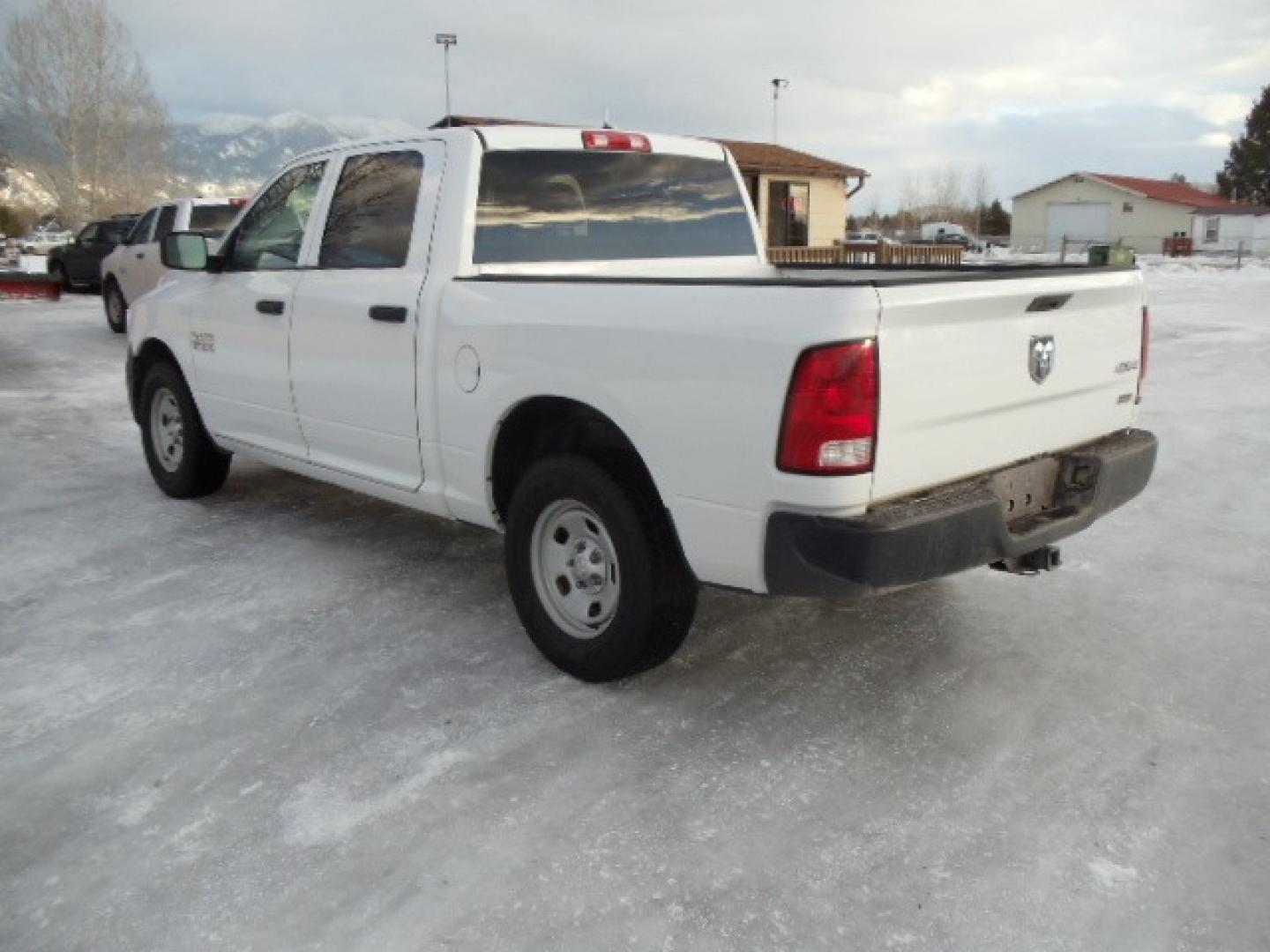 2014 Gray /Gray RAM 1500 Tradesman Crew Cab SWB 4WD (1C6RR7KG3ES) with an 3.6L V6 DOHC 24V FFV engine, 6-Speed Automatic transmission, located at 5465 Highway 2 W., Columbia Falls, MT, 59912, (406) 892-4407, 48.352188, -114.240929 - This truck was previously owned by the federal government so it has been well maintained and taken care of. The vehicle is very clean inside and out with great tires and low miles. This is the crew cab short box. - Photo#4