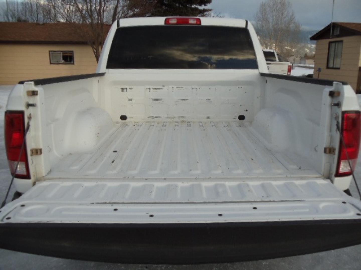 2014 Gray /Gray RAM 1500 Tradesman Crew Cab SWB 4WD (1C6RR7KG3ES) with an 3.6L V6 DOHC 24V FFV engine, 6-Speed Automatic transmission, located at 5465 Highway 2 W., Columbia Falls, MT, 59912, (406) 892-4407, 48.352188, -114.240929 - This truck was previously owned by the federal government so it has been well maintained and taken care of. The vehicle is very clean inside and out with great tires and low miles. This is the crew cab short box. - Photo#7