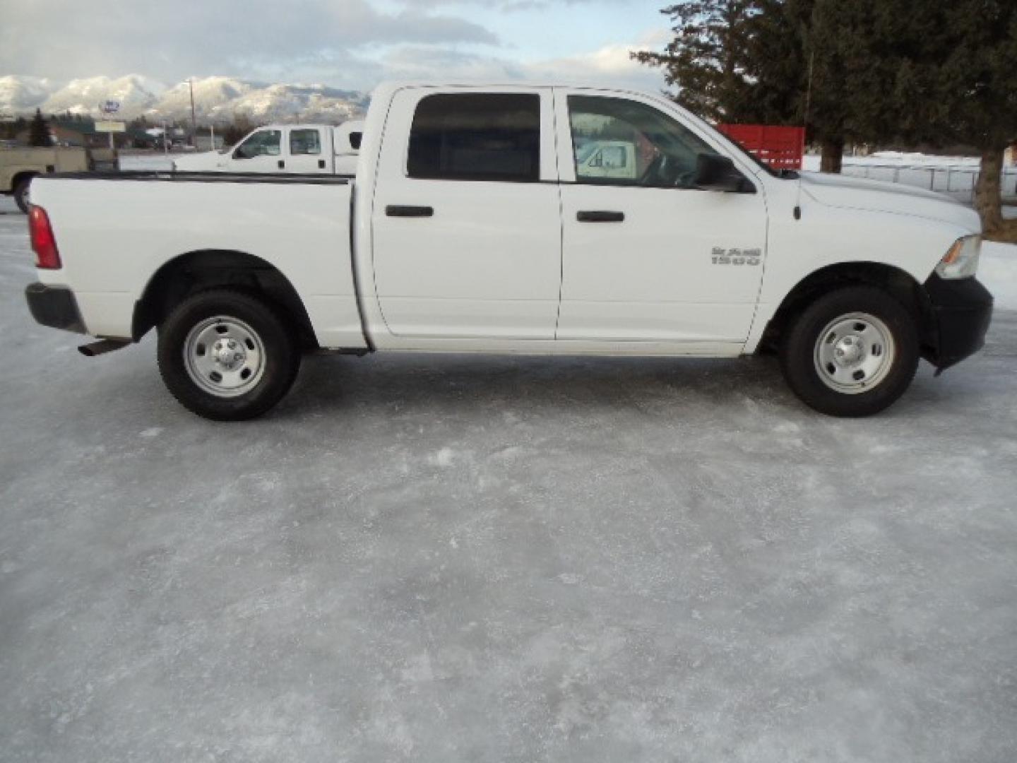 2014 White /Gray RAM 1500 Tradesman Crew Cab SWB 4WD (1C6RR7KG9ES) with an 3.6L V6 DOHC 24V FFV engine, 6-Speed Automatic transmission, located at 5465 Highway 2 W., Columbia Falls, MT, 59912, (406) 892-4407, 48.352188, -114.240929 - This truck was previously owned by the federal government so it has been well maintained and taken care of. The truck is very clean inside and out with good tires and low actual miles. This is the crew cab short box. - Photo#9