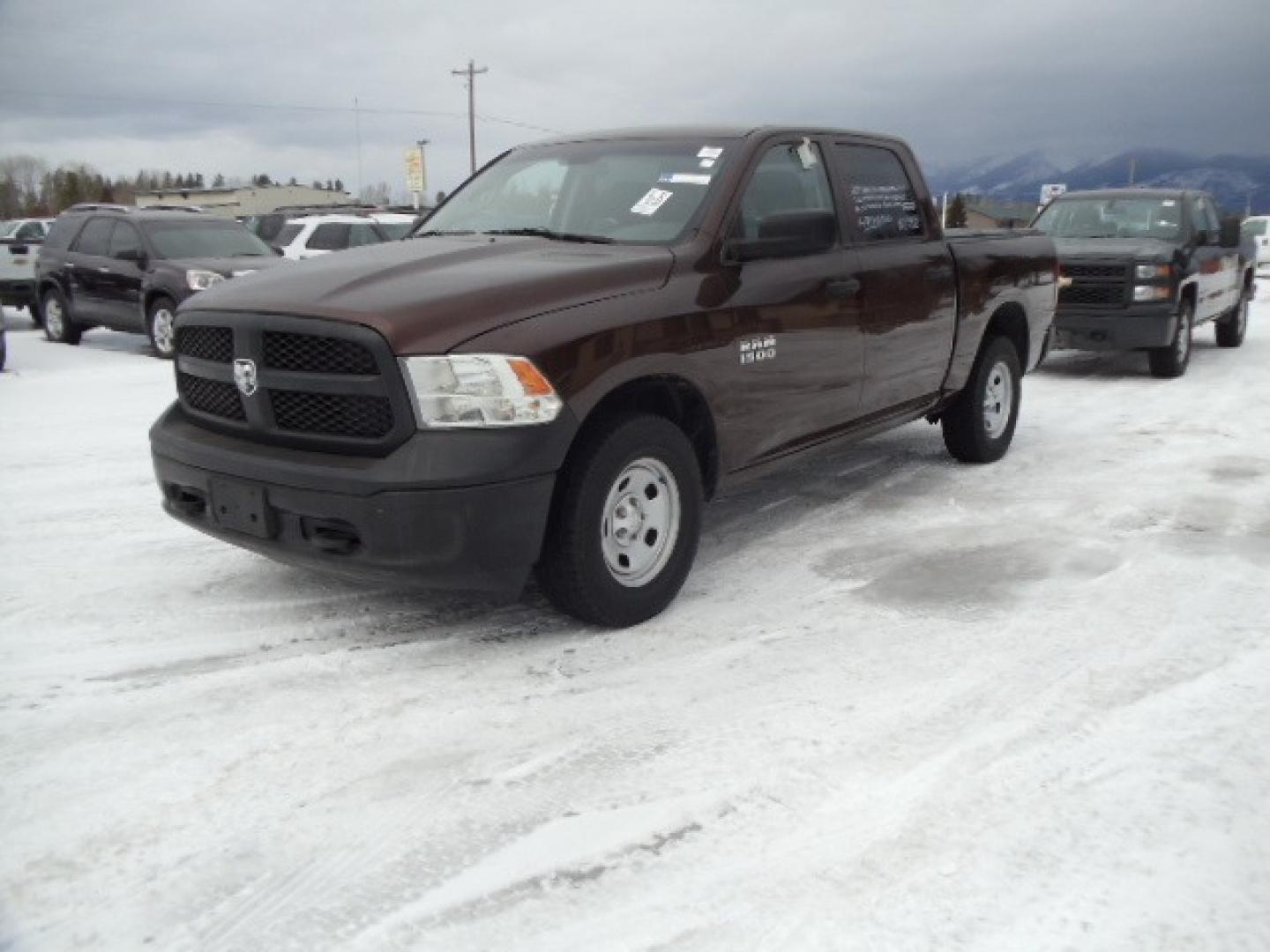 2014 Blue /Gray RAM 1500 Tradesman Crew Cab SWB 4WD (1C6RR7KG8ES) with an 3.6L V6 DOHC 24V FFV engine, 6-Speed Automatic transmission, located at 5465 Highway 2 W., Columbia Falls, MT, 59912, (406) 892-4407, 48.352188, -114.240929 - This truck was previously owned by the federal government so it has been well maintained and taken care of. The truck is very clean inside and out with great tires and super low actual miles. - Photo#2