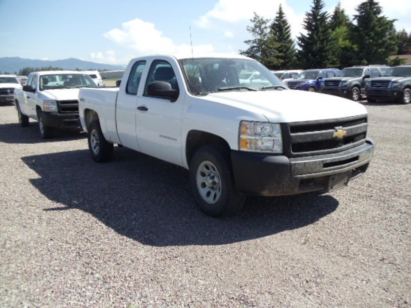 2012 White /Grey Chevrolet Silverado 1500 Work Truck Ext. Cab 4WD (1GCRKPE75CZ) with an 5.3L V8 OHV 16V FFV engine, 4-Speed Automatic transmission, located at 5465 Highway 2 W., Columbia Falls, MT, 59912, (406) 892-4407, 48.352188, -114.240929 - Photo#0