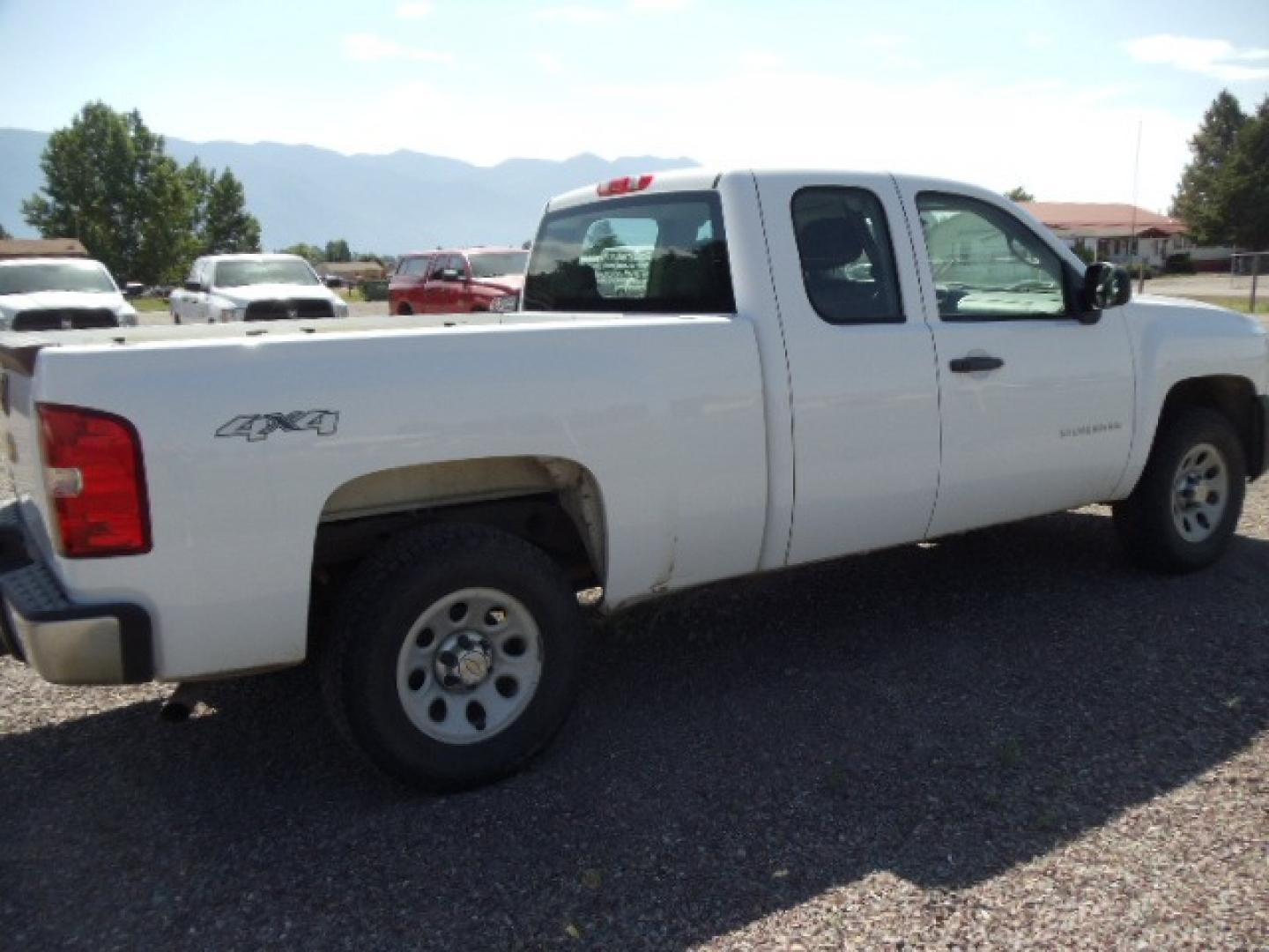 2012 White /Grey Chevrolet Silverado 1500 Work Truck Ext. Cab 4WD (1GCRKPE75CZ) with an 5.3L V8 OHV 16V FFV engine, 4-Speed Automatic transmission, located at 5465 Highway 2 W., Columbia Falls, MT, 59912, (406) 892-4407, 48.352188, -114.240929 - Photo#9