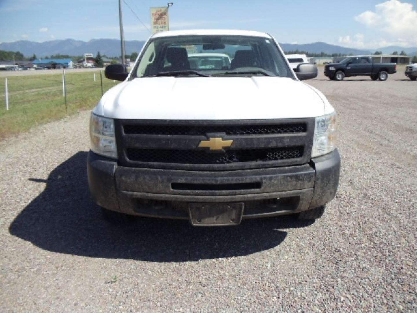 2012 White /Grey Chevrolet Silverado 1500 Work Truck Ext. Cab 4WD (1GCRKPE75CZ) with an 5.3L V8 OHV 16V FFV engine, 4-Speed Automatic transmission, located at 5465 Highway 2 W., Columbia Falls, MT, 59912, (406) 892-4407, 48.352188, -114.240929 - Photo#1