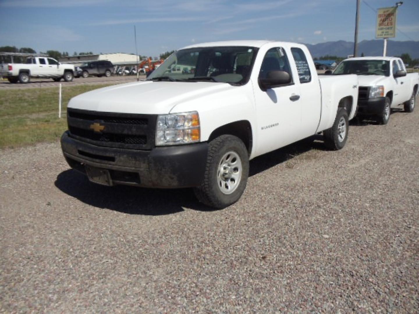 2012 White /Grey Chevrolet Silverado 1500 Work Truck Ext. Cab 4WD (1GCRKPE75CZ) with an 5.3L V8 OHV 16V FFV engine, 4-Speed Automatic transmission, located at 5465 Highway 2 W., Columbia Falls, MT, 59912, (406) 892-4407, 48.352188, -114.240929 - Photo#2