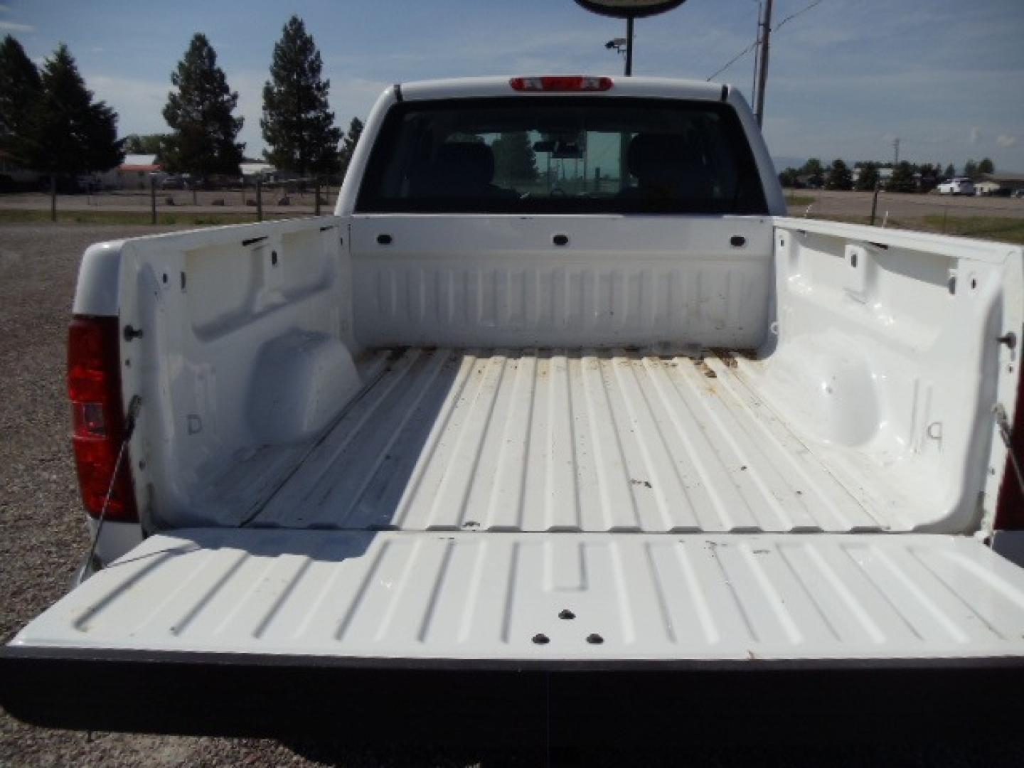 2012 White /Grey Chevrolet Silverado 1500 Work Truck Ext. Cab 4WD (1GCRKPE75CZ) with an 5.3L V8 OHV 16V FFV engine, 4-Speed Automatic transmission, located at 5465 Highway 2 W., Columbia Falls, MT, 59912, (406) 892-4407, 48.352188, -114.240929 - Photo#7