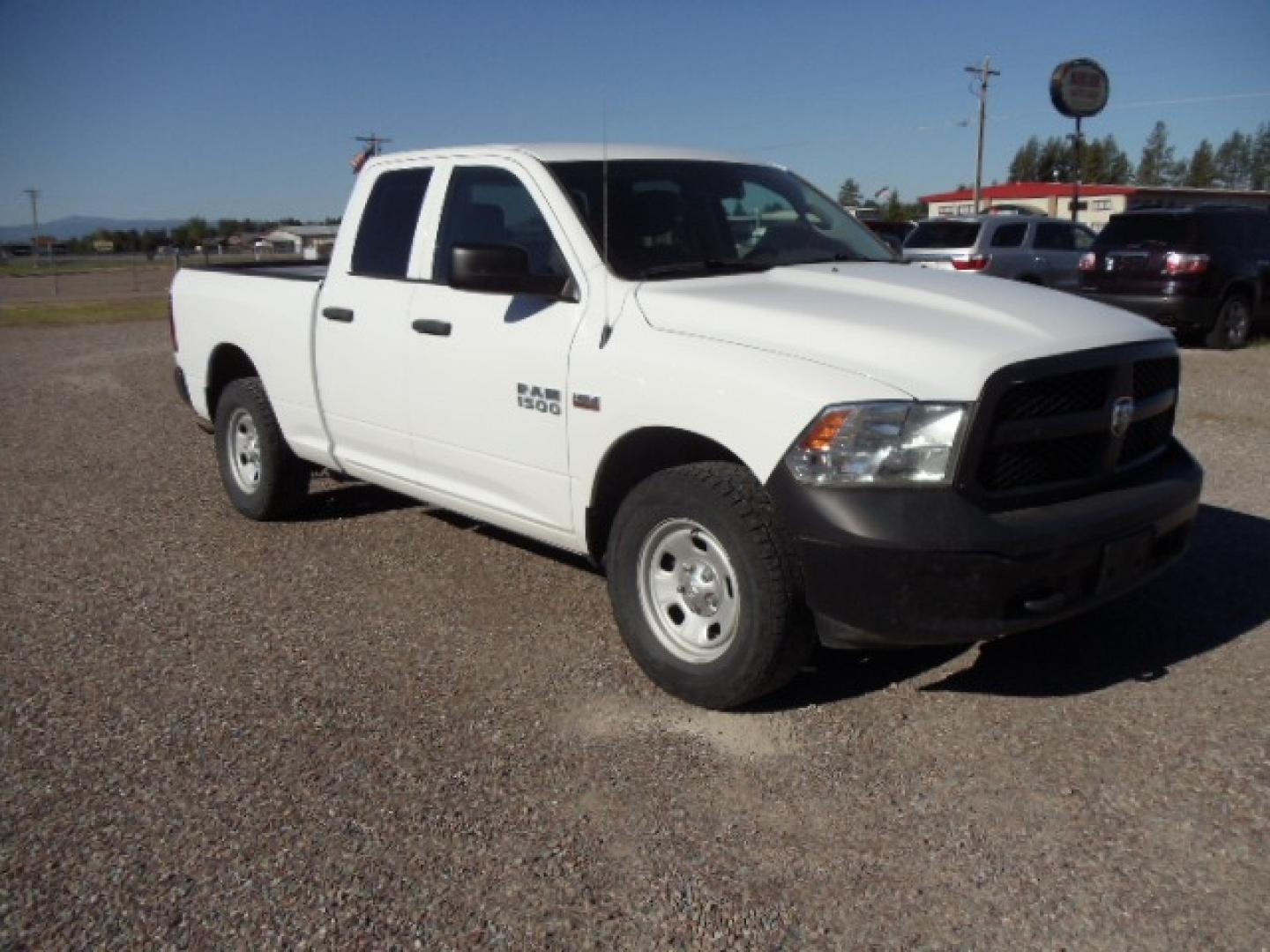 2016 White /Gray RAM 1500 Tradesman Quad Cab 4WD (1C6RR7FT1GS) with an 5.7L V8 OHV 16V HEMI engine, 6A transmission, located at 5465 Highway 2 W., Columbia Falls, MT, 59912, (406) 892-4407, 48.352188, -114.240929 - Photo#0