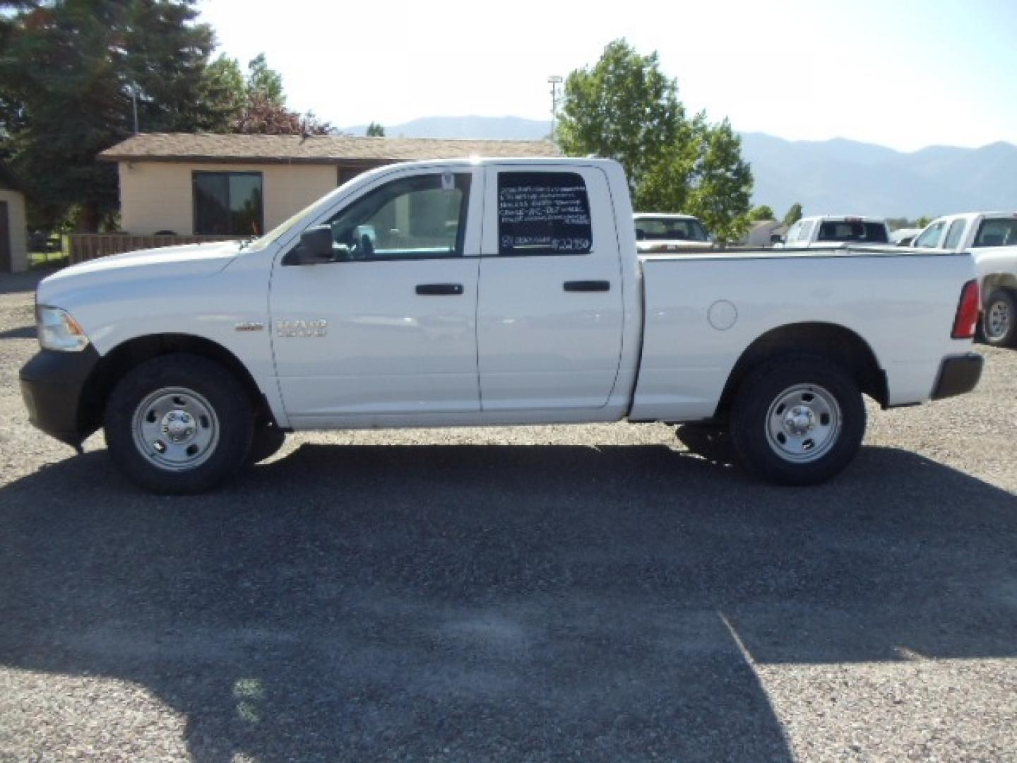 2016 White /Gray RAM 1500 Tradesman Quad Cab 4WD (1C6RR7FT1GS) with an 5.7L V8 OHV 16V HEMI engine, 6A transmission, located at 5465 Highway 2 W., Columbia Falls, MT, 59912, (406) 892-4407, 48.352188, -114.240929 - Photo#3