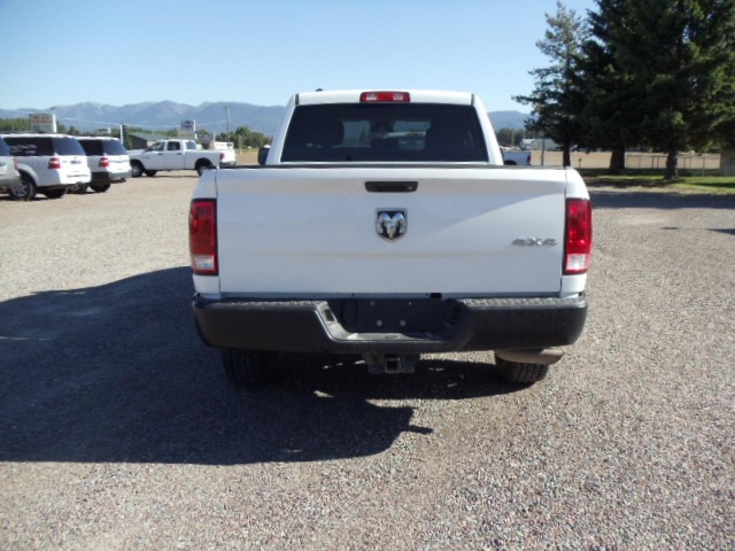 2016 White /Gray RAM 1500 Tradesman Quad Cab 4WD (1C6RR7FT1GS) with an 5.7L V8 OHV 16V HEMI engine, 6A transmission, located at 5465 Highway 2 W., Columbia Falls, MT, 59912, (406) 892-4407, 48.352188, -114.240929 - Photo#5