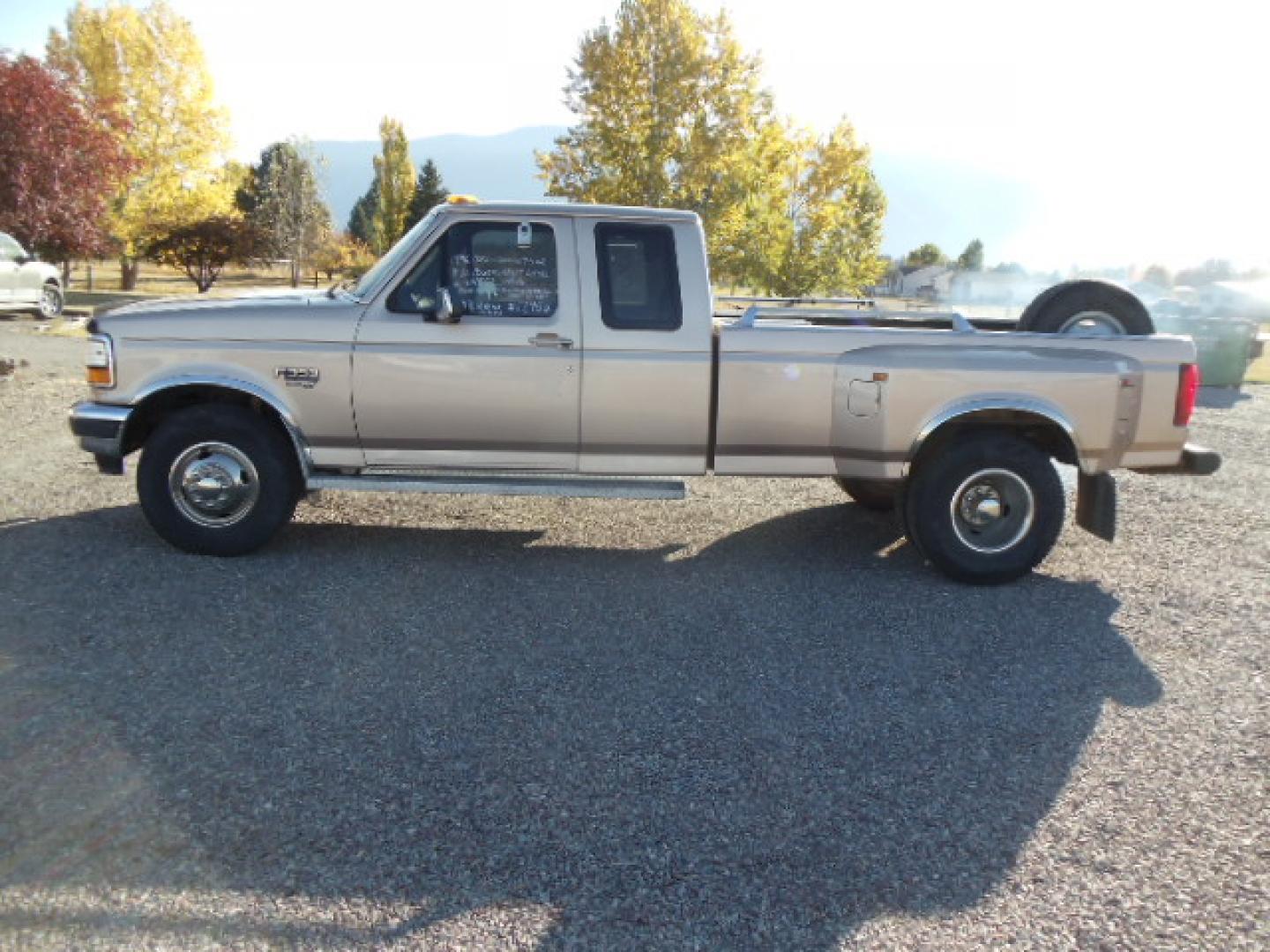 1996 /Tan Ford F-350 XLT SuperCab DRW 2WD (1FTJX35F1TE) with an 7.3L V8 OHV 16V TURBO DIESEL engine, Automatic transmission, located at 5465 Highway 2 W., Columbia Falls, MT, 59912, (406) 892-4407, 48.352188, -114.240929 - Photo#2