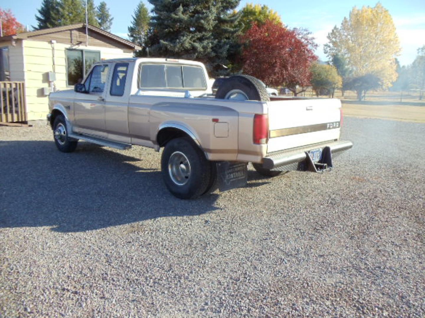 1996 /Tan Ford F-350 XLT SuperCab DRW 2WD (1FTJX35F1TE) with an 7.3L V8 OHV 16V TURBO DIESEL engine, Automatic transmission, located at 5465 Highway 2 W., Columbia Falls, MT, 59912, (406) 892-4407, 48.352188, -114.240929 - Photo#5