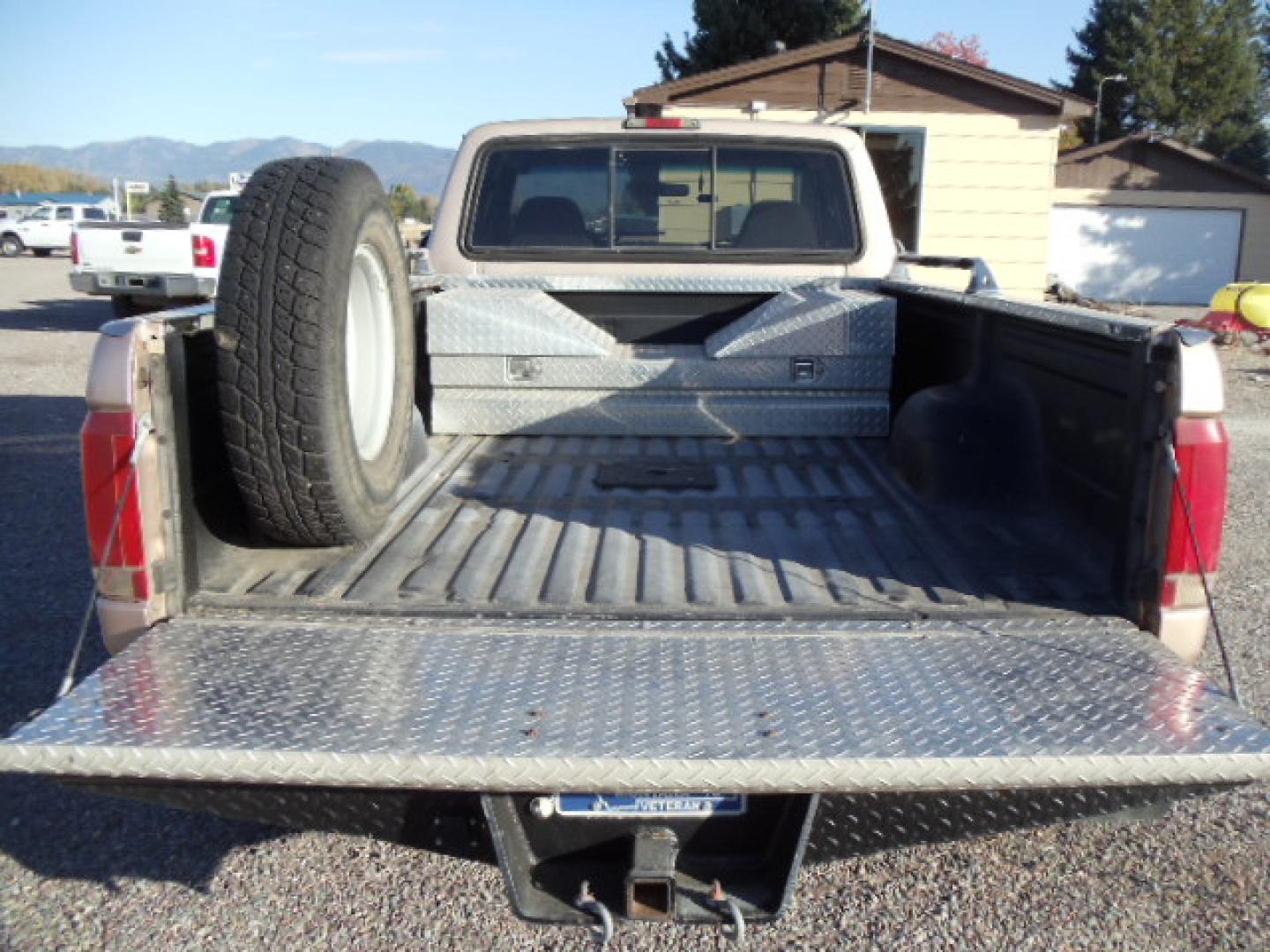 1996 /Tan Ford F-350 XLT SuperCab DRW 2WD (1FTJX35F1TE) with an 7.3L V8 OHV 16V TURBO DIESEL engine, Automatic transmission, located at 5465 Highway 2 W., Columbia Falls, MT, 59912, (406) 892-4407, 48.352188, -114.240929 - Photo#6