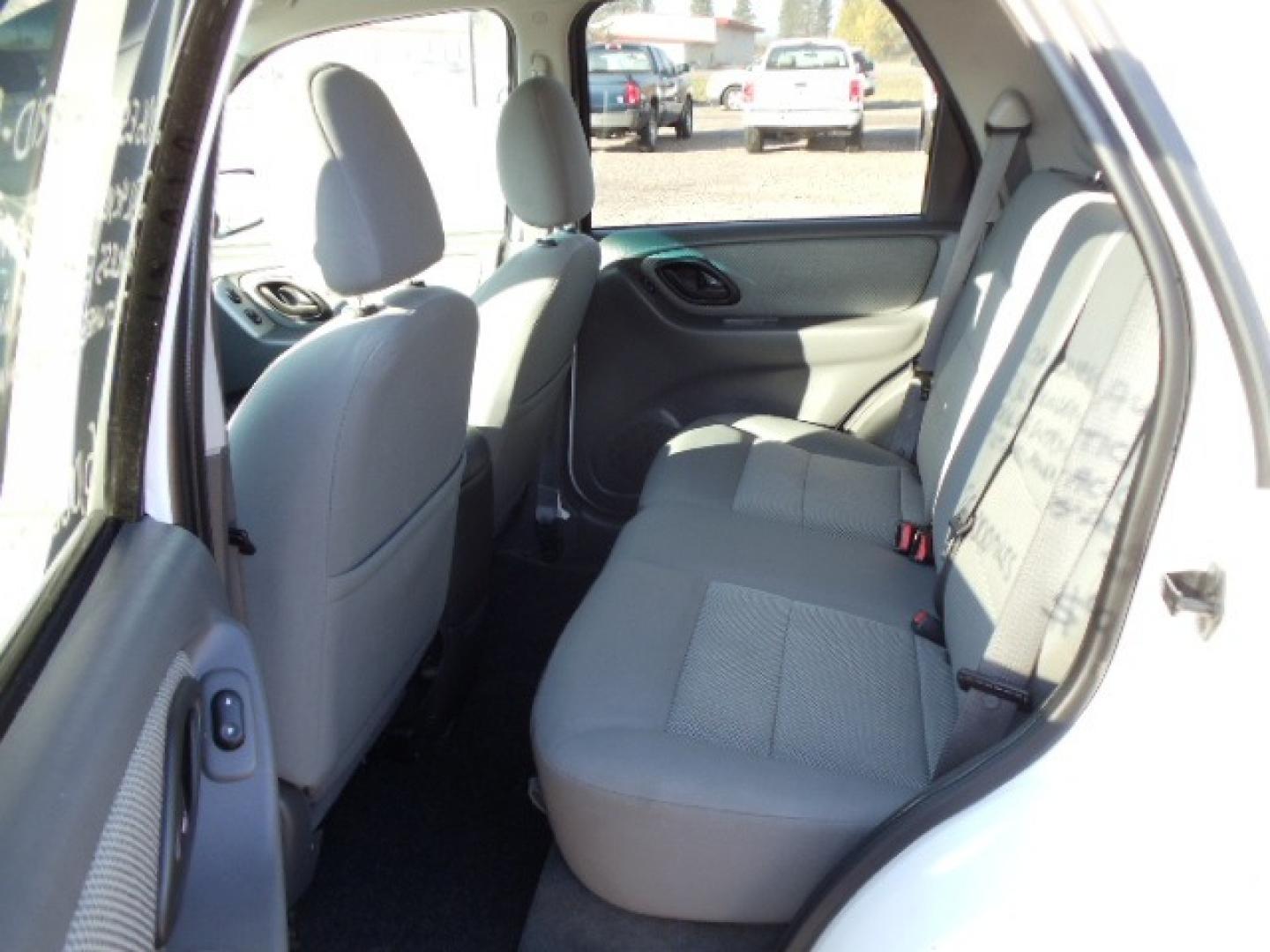 2006 White /Gray Ford Escape Hybrid (1FMYU96H46K) with an L4, 2.3L; AC engine, CVT Automatic transmission, located at 5465 Highway 2 W., Columbia Falls, MT, 59912, (406) 892-4407, 48.352188, -114.240929 - Cruise control AC CD Tilt wheel Power windows door locks and mirrors Brand new tires - Photo#14