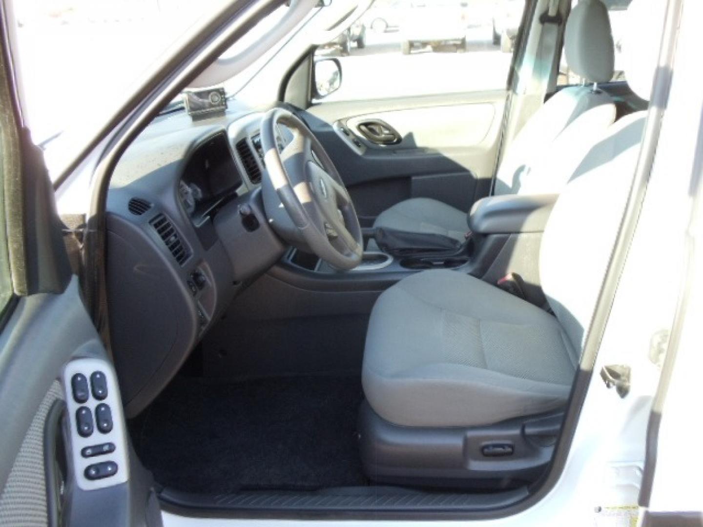 2006 White /Gray Ford Escape Hybrid (1FMYU96H46K) with an L4, 2.3L; AC engine, CVT Automatic transmission, located at 5465 Highway 2 W., Columbia Falls, MT, 59912, (406) 892-4407, 48.352188, -114.240929 - Cruise control AC CD Tilt wheel Power windows door locks and mirrors Brand new tires - Photo#15