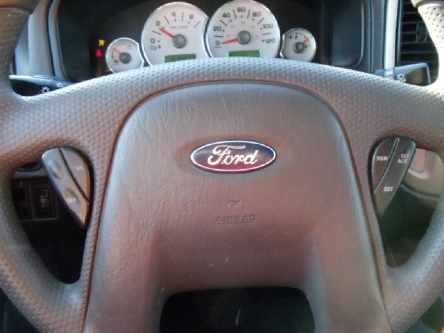 2006 White /Gray Ford Escape Hybrid (1FMYU96H46K) with an L4, 2.3L; AC engine, CVT Automatic transmission, located at 5465 Highway 2 W., Columbia Falls, MT, 59912, (406) 892-4407, 48.352188, -114.240929 - Cruise control AC CD Tilt wheel Power windows door locks and mirrors Brand new tires - Photo#17