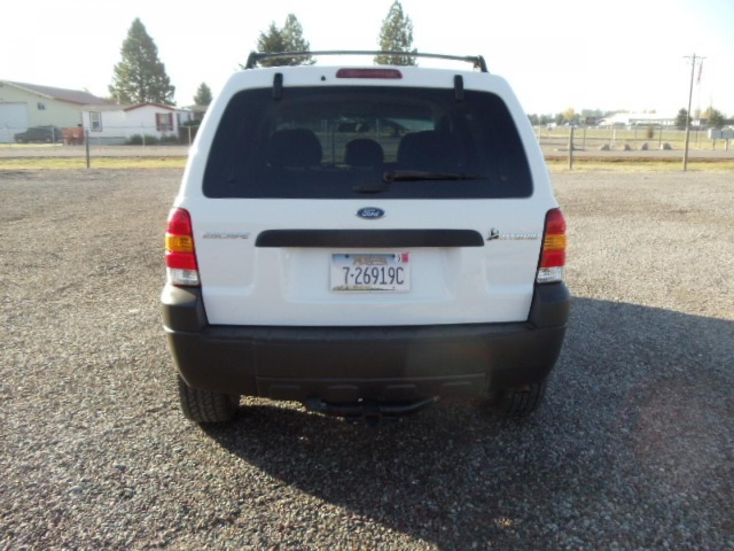 2006 White /Gray Ford Escape Hybrid (1FMYU96H46K) with an L4, 2.3L; AC engine, CVT Automatic transmission, located at 5465 Highway 2 W., Columbia Falls, MT, 59912, (406) 892-4407, 48.352188, -114.240929 - Cruise control AC CD Tilt wheel Power windows door locks and mirrors Brand new tires - Photo#5